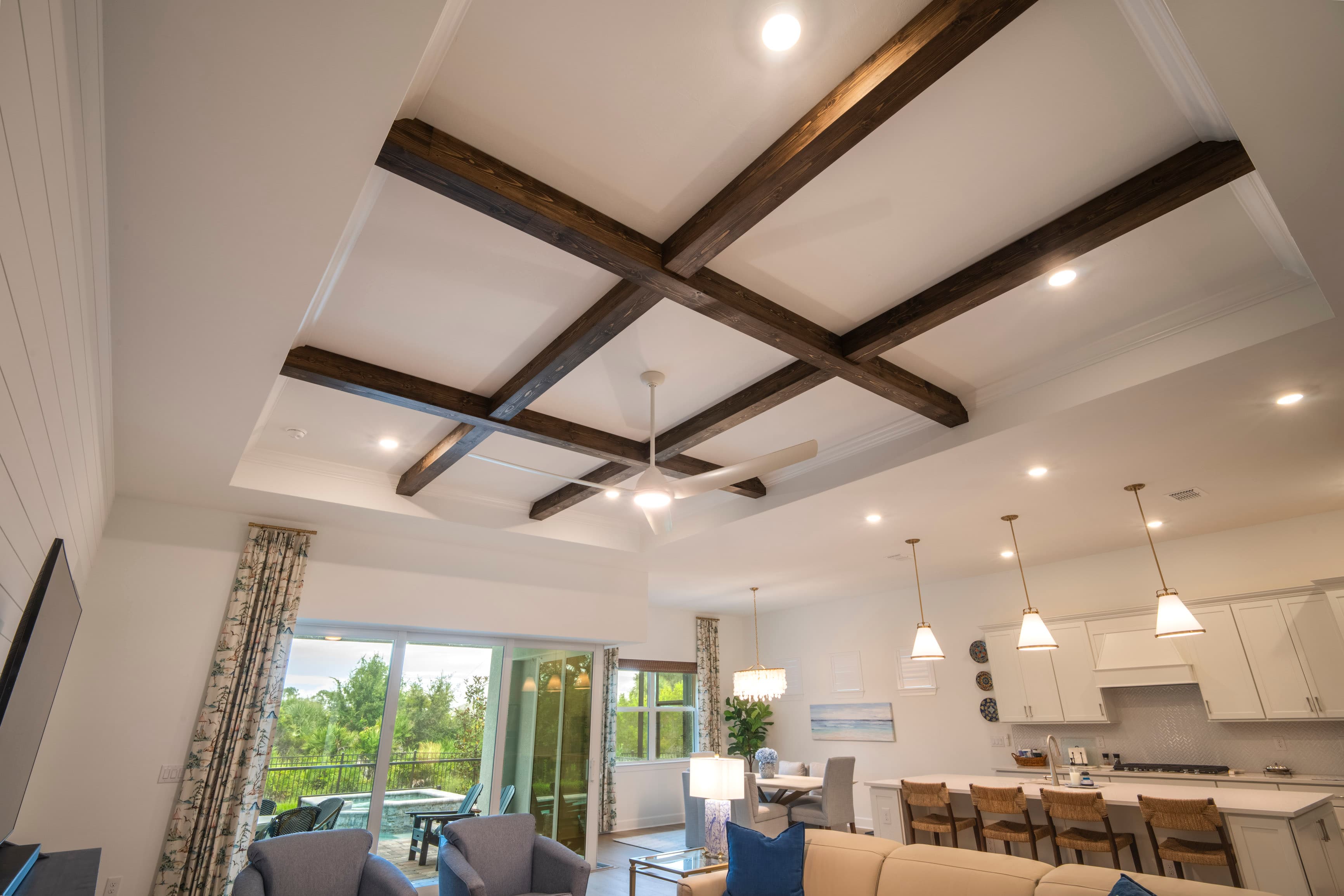 Bedroom with custom ceiling beams